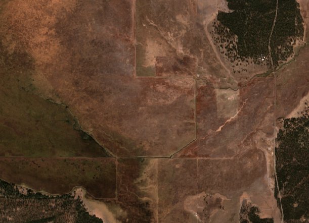 Close-up of the breach area on October 13, 2024, showing the YJ canal running north–south and the Kittredge canal running east–west.